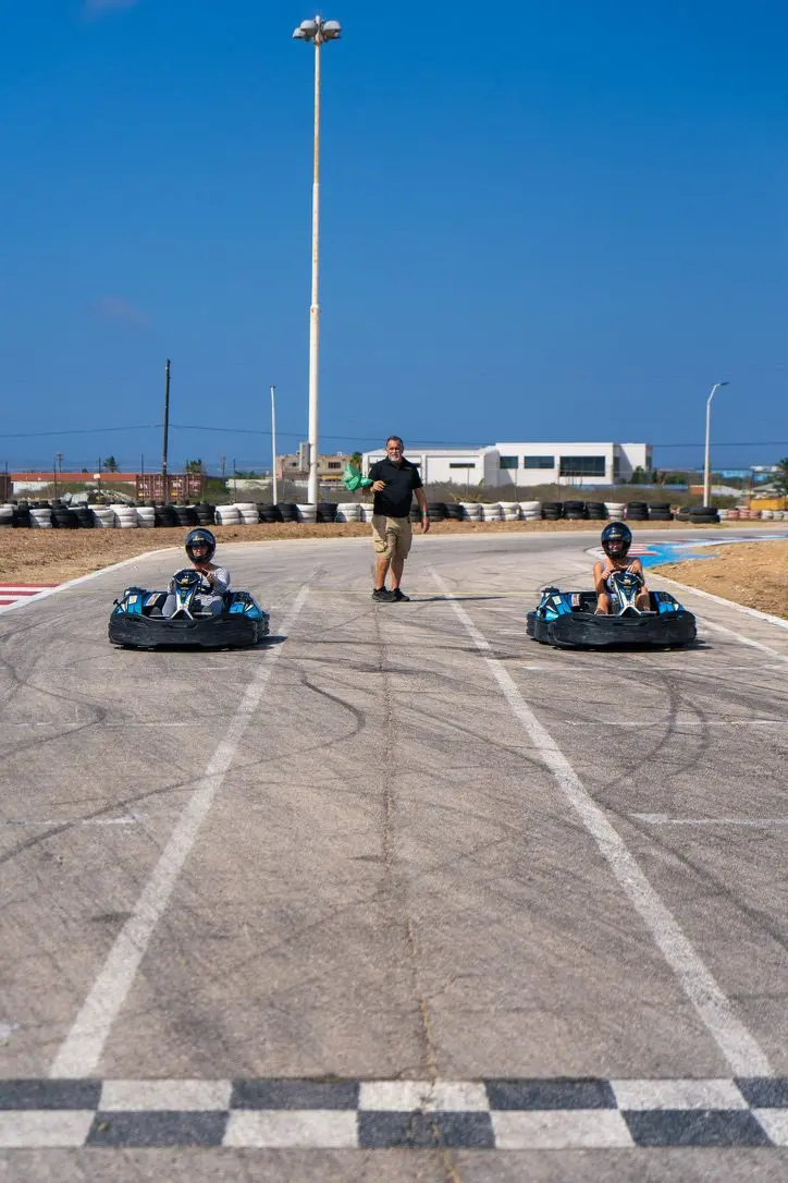 Stephanie in a go-kart at Bushiri Karting
