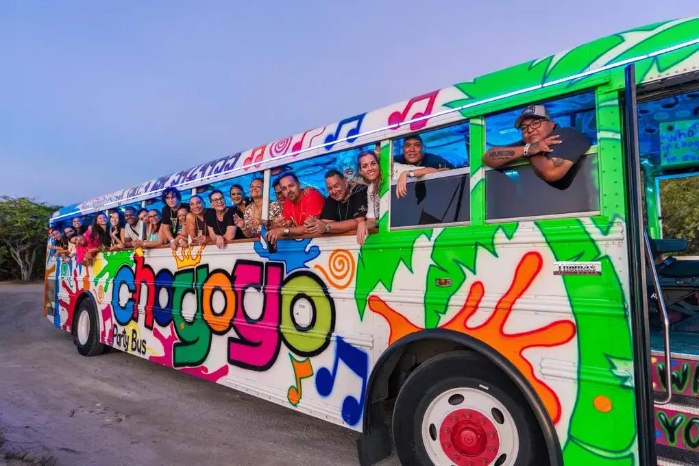 Our team with a drink on the Chogogo party bus