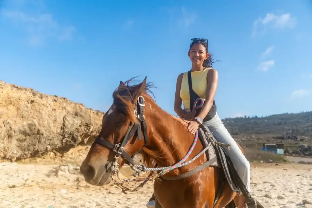 Talitha on horseback by the coast